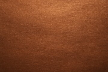 Fototapeta premium Luxurious textured background of shiny, grainy matte copper foil, exhibiting a subtly sanded or brushed metal finish with warm, reflective metallic tones.