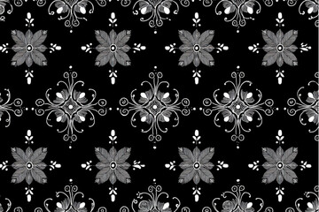 Seamless pattern of white floral and swirl designs on a black background for decorative applications
