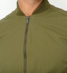 Détail blouson vert coupe-vent fermeture éclair © LUC - PHOTOGRAPHE