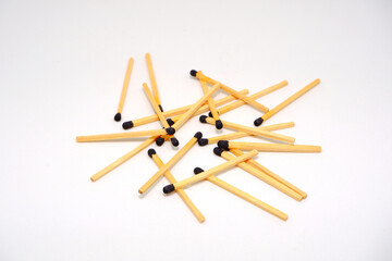 matchsticks on a white background closeup shot 