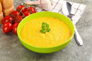 Vegetarian corn cream soup served parsley