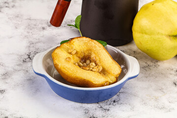 Baked quince with honey and cedar