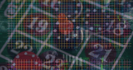 Displaying roulette wheel and betting table with chips, grid overlay in casino, with numeric data