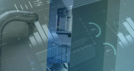 Displaying data dashboard overlaying office metal panels, with charts, rings, binders and chair