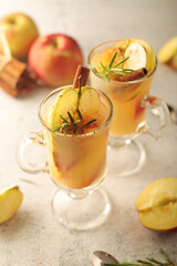 Warm apple autumn drink with cinnamon