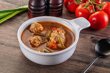 Tomato Soup with meatballs and vegetables