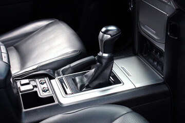 Automatic gearbox lever in New car. Close-up Automatic transmission gear shift knob, Close-up of...