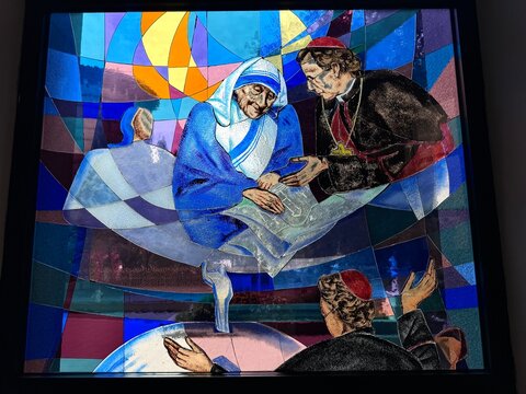 View of a religious stained glass window depicting Mother Teresa in a church in Tirana, Albania
