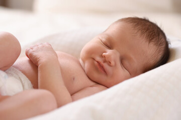 Bedtime. Cute little baby sleeping in lounger indoors
