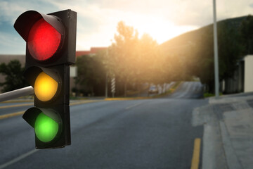 Traffic lights on empty road. Signaling device