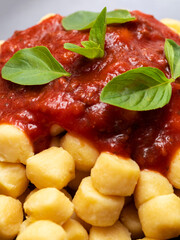 Gnocchi di patata, italian potato noodle with tomato sauce and basil