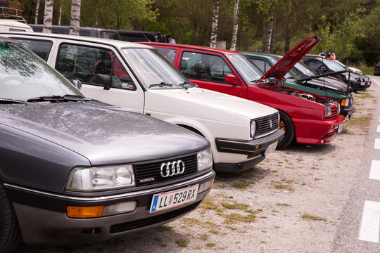 Vintage european car show with classic models parked in a row on gravel lot gti treffen