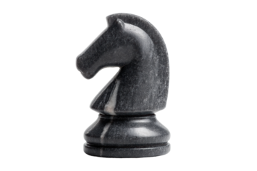 Black marble chess knight piece with smooth polished finish on black background, cut out