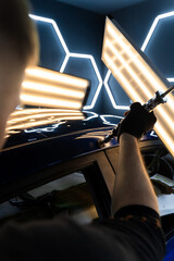 Expert uses advanced pulling tool to restore metal shape without repainting. Using pulling tool for...