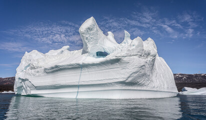 Large unusually shaped iceberg with horns in Disko Bay, Greenland