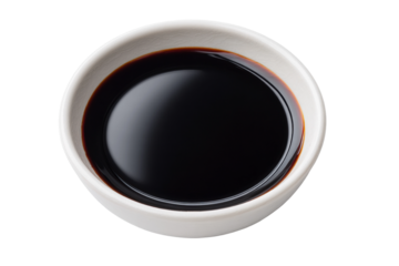 Top view of dark soy sauce in a white ceramic bowl, cut out