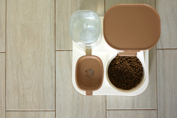 A welldesigned Pet Feeding Station that includes both Water and Food Dispenser for your pets