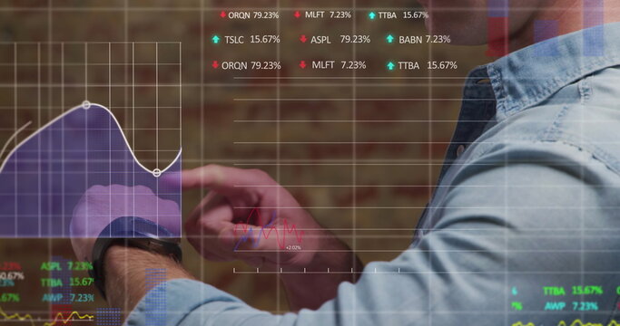 Image of data processing over caucasian businessman using smartwatch - Powered by Adobe