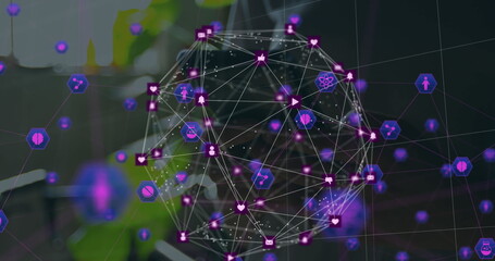 Globe of digital icons and network of medical icons against mid section of a person using smartphone