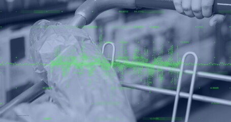 Statistical data processing against close up of a shopping cart at supermarket
