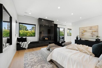 Modern luxury home exterior at sunset with pool, outdoor lounge, and contemporary architecture