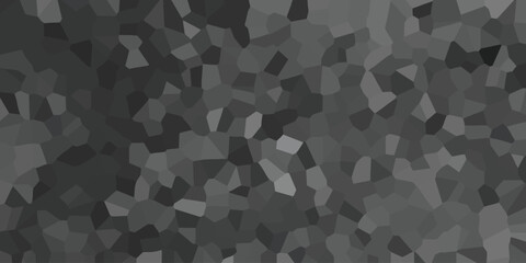 Abstract monochrome geometric pattern featuring a repeating mosaic of polygons in varied shades of gray creating a textured design