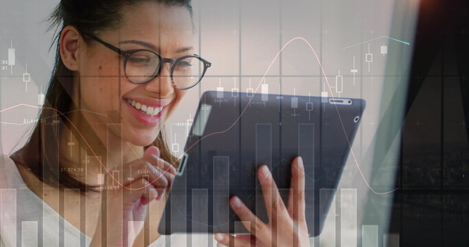 Image of statistical data processing over woman using digital tablet