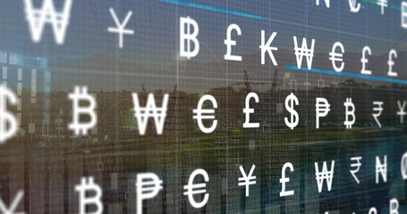 Image of currency symbols moving over cityscape
