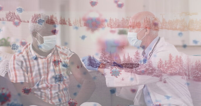 Image of virus cells over caucasian male doctor with patient