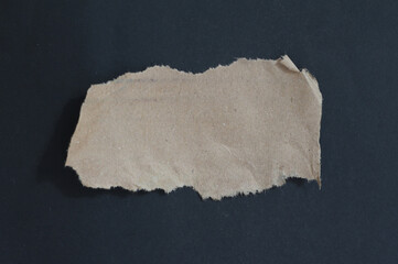 rip paper texture on black background