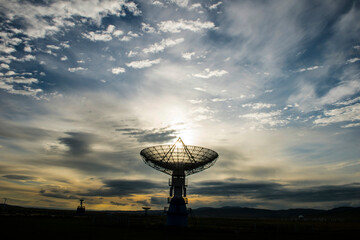 Radio telescopes and the Milky Way at night