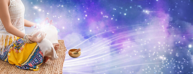 Young woman with Tibetan singing bowl meditating at home