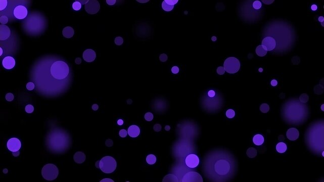 Energetic bokeh of vibrant violet lights on black, perfect for parties, nightlife, or festive backgrounds.
