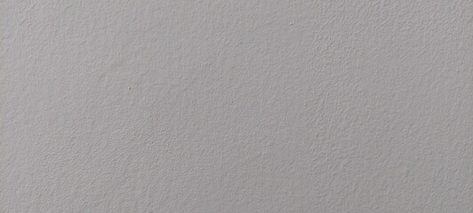 Imagen de una superficie gris con un patrón sutil de textura rugosa, ideal como fondo neutro o recurso visual para proyectos gráficos. La textura ofrece un acabado mate y uniforme con relieve fino, pe