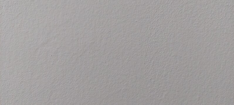  Fondo de textura gris claro con un acabado mate y una superficie ligeramente rugosa.