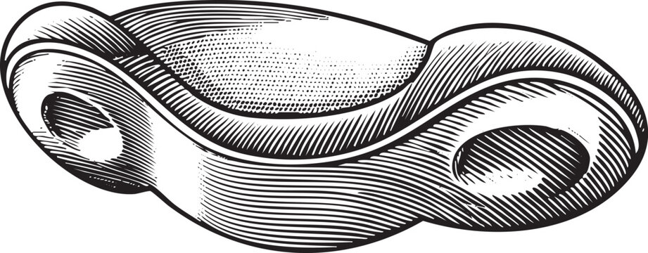 stylized curved form rests on a smooth surface.