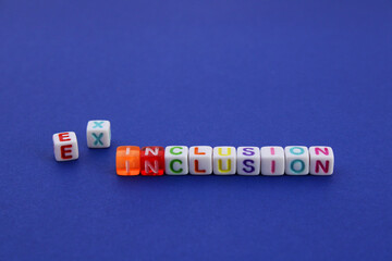 Cubes that change the meaning of a word by replacing two letters, INCLUSION and EXCLUSION