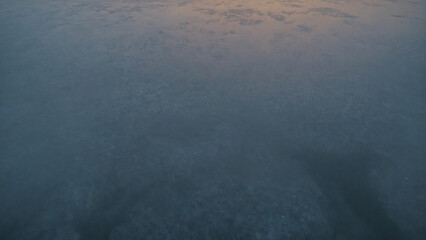 Fototapeta premium Aerial Moody Ocean Water Texture with Natural Light at Sunset Seascape