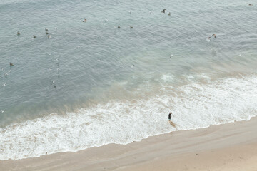 Beach landscapes in summer. Ballenita Beach in the province of Santa Elena, Ecuador. You can see the sea, birds, and beach or sailing motifs.