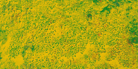 Abstract textured artwork with a vibrant composition featuring a mix of yellow green and red hues suggesting a natural landscape pattern for design and backgrounds.