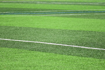 Obraz premium artificial green grass background for playground