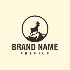 Minimalist Silhouette Goat Standing on Mountain inside Circle Logo Template