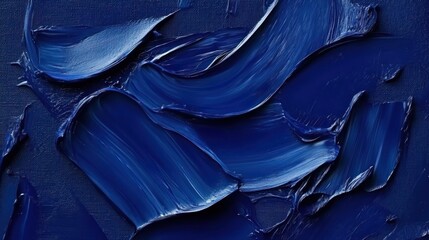 Obraz premium Close-up view of textured deep blue paint strokes.