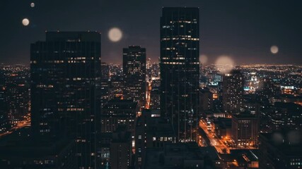 City nightscape with glowing buildings and streets