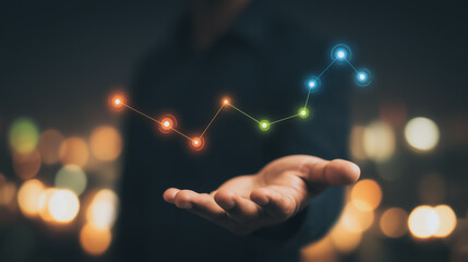 Visualizing Progress: A hand cradles a vibrant, glowing chart, symbolizing growth and the forward trajectory of success in a world of technological advancement and innovation.