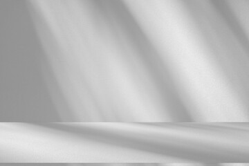 Wall interior background, studio and backdrops show products.with shadow from window color white and grey. background for text insertion and presentation product	
