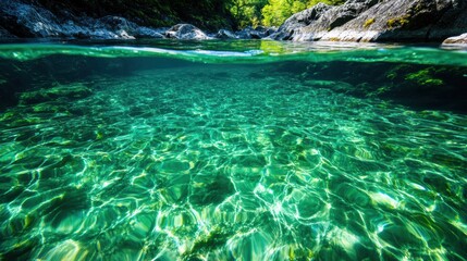 Crystal Clear Water Under Bright Sunlight in Natural Rocky Setting