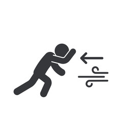 Isolated pictogram of person struggling to walk against strong wind, symbolizing heavy wind during rainy season, weather hazard warning icon