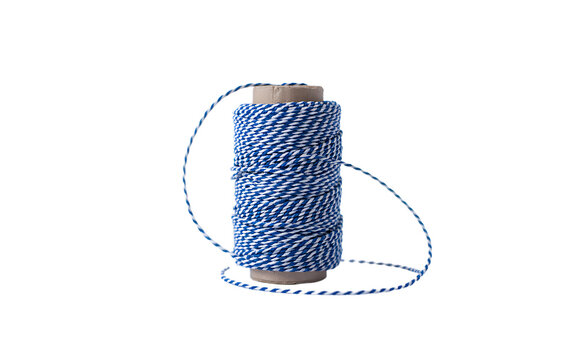 Spool of blue and white twisted baker&rsquo;s twine with loose end isolated on white background for crafts and packaging