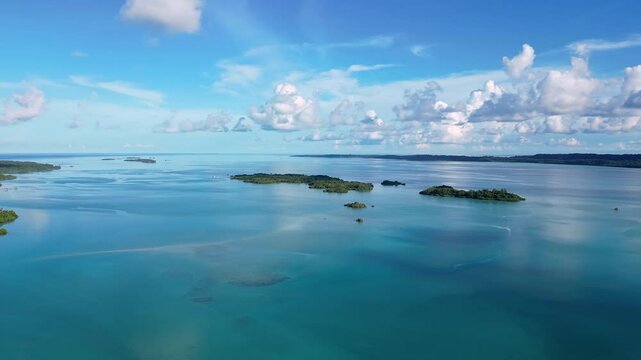 Derawan, Indonesia: Aerial drone panorama of the stunning Maratua lagoon and island in east Kalimantan in Indonesian Borneo. 